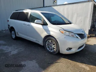 2015 Toyota Sienna XLE with VIN 5TDYK3DC0FS679812, listed as a Copart auction lot 61600775 with 118,483 mi miles and Salvage title. Bid and sale history available at DreamBid. Image 4.