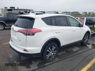 2017 Toyota RAV4 LE with VIN JTMZFREV9HJ704296, listed as a IAAI auction lot 41876996 with 85,605 mi miles and . Bid and sale history available at DreamBid. Image 4.