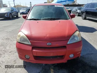 2002 Suzuki Aerio SX z VIN JS2RC41H225101871, wystawiony jako Copart lot #58211775 z przebiegiem 127 633 mil mil oraz Szkoda całkowita • Salvage title. Historia ofert i sprzedaży dostępna na DreamBid. Obrazek 5.