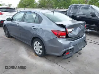 2020 Kia Rio LX with VIN 3KPA24AD9LE332005, listed as a IAAI auction lot 41870210 with 71,777 mi miles and . Bid and sale history available at DreamBid. Image 3.