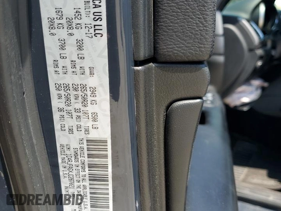 2018 Jeep Grand Cherokee Altitude with VIN 1C4RJFAGXJC267021, listed as a Copart auction lot 58762945 with 93,347 mi miles and Salvage title. Bid and sale history available at DreamBid. Image 13.