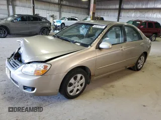 2008 Kia Spectra EX with VIN KNAFE121985562823, listed as a Copart auction lot 58824705 with 143,673 mi miles and Salvage title. Bid and sale history available at DreamBid. Image 1.