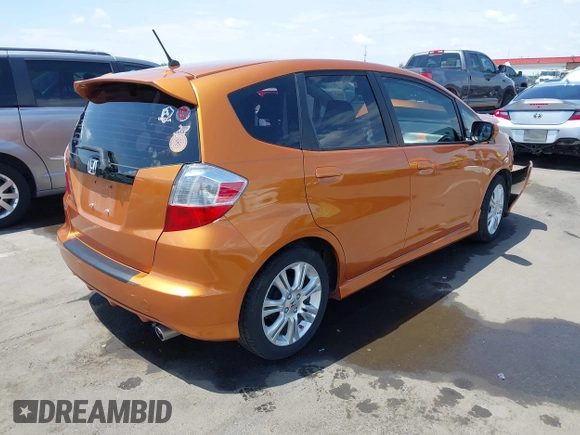 2009 Honda Fit Sport z VIN JHMGE88459S053122, wystawiony jako IAAI lot #42195267 z przebiegiem 47 349 mil mil oraz . Historia ofert i sprzedaży dostępna na DreamBid. Obrazek 4.
