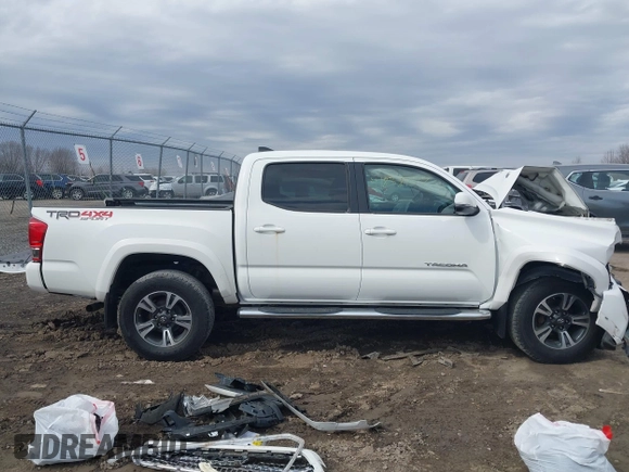 2017 Toyota Tacoma SR5 with VIN 3TMCZ5AN3HM106655, listed as a IAAI auction lot 41838777 with 63,740 mi miles and . Bid and sale history available at DreamBid. Image 14.