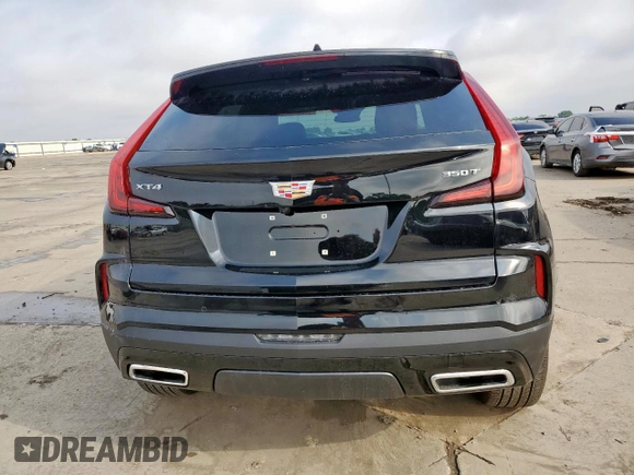 2024 Cadillac XT4 FWD Premium Luxury with VIN 1GYFZCR49RF248341, listed as a Copart auction lot 58586035 with 12,490 mi miles and Salvage title. Bid and sale history available at DreamBid. Image 6.