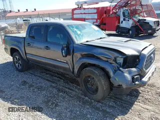 2018 Toyota Tacoma SR with VIN 5TFCZ5AN9JX123749, listed as a IAAI auction lot 41768884 with 42,852 mi miles and . Bid and sale history available at DreamBid. Image 1.