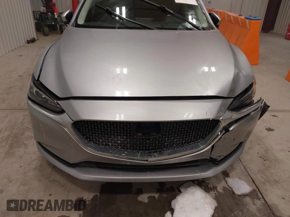 2018 Mazda 6 Touring with VIN JM1GL1VM8J1312778, listed as a IAAI auction lot 41387098 with 129,611 mi miles and . Bid and sale history available at carsss.com. Image 6.