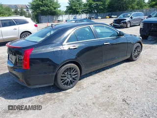 2014 Cadillac ATS Standard RWD with VIN 1G6AA5RA0E0102256, listed as a IAAI auction lot 42659190 with 116,912 mi miles and . Bid and sale history available at DreamBid. Image 4.
