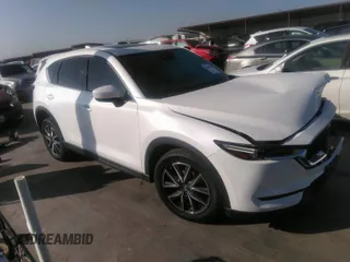 2018 Mazda CX-5 Grand Touring with VIN JM3KFADM4J0309540, listed as a IAAI auction lot 41868480 with 89,110 mi miles. Bid and sale history available at carsss.com. Image 1.