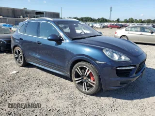 2014 Porsche Cayenne Turbo with VIN WP1AC2A27ELA87214, listed as a Copart auction lot 74175554 with 122,988 mi miles and Salvage title. Bid and sale history available at DreamBid. Image 4.