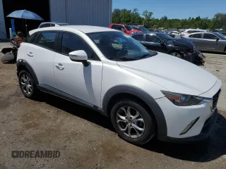 2016 Mazda CX-3 Touring with VIN JM1DKDC71G0130858, listed as a Copart auction lot 52047765 with 115,299 mi miles and Salvage Title. Bid and sale history available at carsss.com. Image 4.