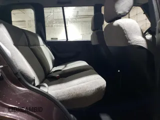 1998 Chevrolet Tracker z VIN 2CNBJ1362W6919635, wystawiony jako Copart lot #56894355 z przebiegiem 140 298 mil mil oraz Szkoda całkowita • Salvage title. Historia ofert i sprzedaży dostępna na DreamBid. Obrazek 11.