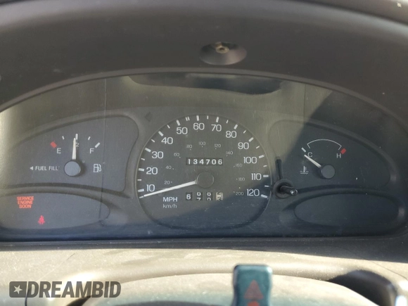 1997 Ford Escort LX with VIN 1FALP13P0VW403591, listed as a Copart auction lot 74321544 with 134,706 mi miles and Salvage Title. Bid and sale history available at DreamBid. Image 9.