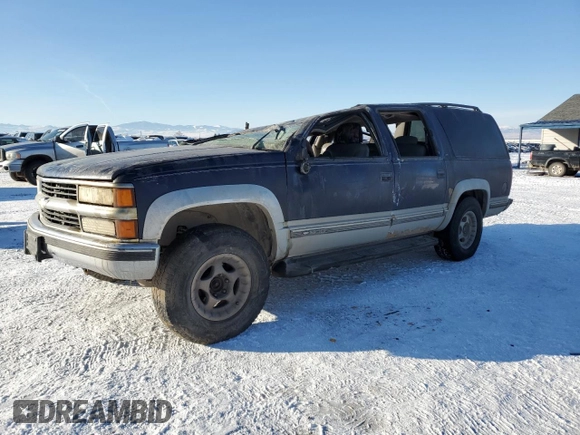 1996 Chevrolet Suburban z VIN 1GNFK16R0TJ417592, wystawiony jako Copart lot #42424015 z przebiegiem 238 536 mil mil oraz Czysty tytuł • Clean title. Historia ofert i sprzedaży dostępna na DreamBid. Obrazek 1.