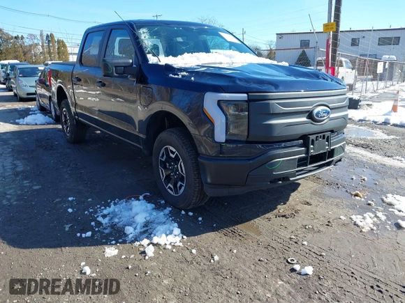 2023 Ford F-150 Lightning Pro with VIN 1FTVW1EL7PWG07081, listed as a IAAI auction lot 38702102 with 9,976 mi miles and . Bid and sale history available at DreamBid. Image 1.