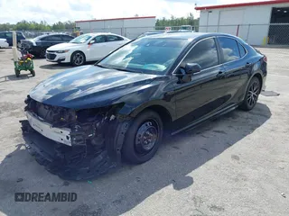 2023 Toyota Camry SE with VIN 4T1G11AK6PU741172, listed as a IAAI auction lot 41599909 with 56,668 mi miles and . Bid and sale history available at DreamBid. Image 21.