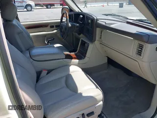 2004 Cadillac Escalade with VIN 1GYEK63N54R122875, listed as a IAAI auction lot 42736386 with 143,422 mi miles and . Bid and sale history available at DreamBid. Image 5.