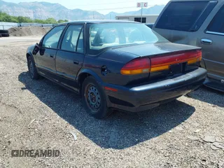 1994 Saturn SL z VIN 1G8ZJ557XRZ269410, wystawiony jako IAAI lot #31653894 z przebiegiem 132 202 mil mil oraz . Historia ofert i sprzedaży dostępna na DreamBid. Obrazek 3.