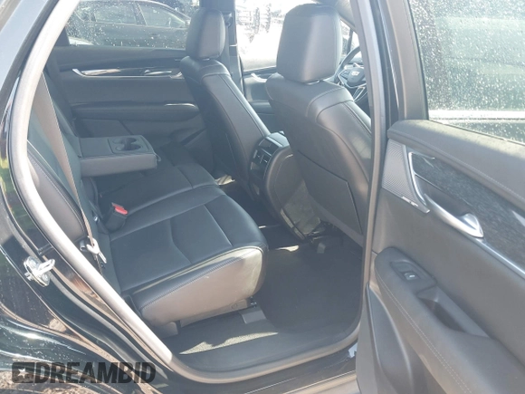 2023 Cadillac XT5 AWD Premium Luxury with VIN 1GYKNDRS7PZ158566, listed as a IAAI auction lot 41763127 with 58,248 mi miles and . Bid and sale history available at DreamBid. Image 8.