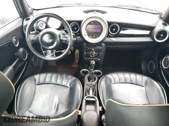 2013 MINI Convertible S с VIN WMWZP3C58DT550592, выставлен на аукционе Copart как лот 56250685 с пробегом 141 821 миль миль и Списание • Salvage title. История ставок и продаж доступна на DreamBid. Изображение 8.