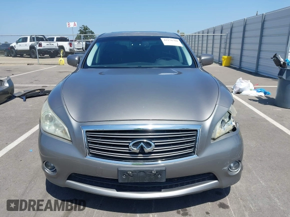 2012 Infiniti M with VIN JN1BY1AR3CM391052, listed as a IAAI auction lot 42178760 with 198,116 mi miles and . Bid and sale history available at DreamBid. Image 13.