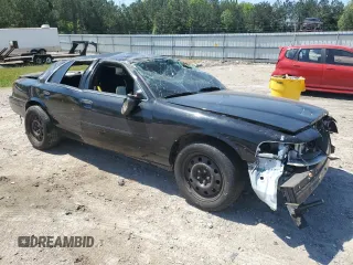 2011 Ford Police Interceptor with VIN 2FABP7BV2BX105686, listed as a Copart auction lot 54908935 with Not provided miles and Salvage title. Bid and sale history available at DreamBid. Image 4.