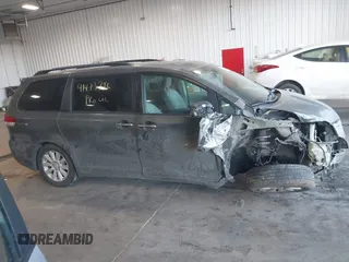 2011 Toyota Sienna XLE with VIN 5TDDK3DC6BS025101, listed as a IAAI auction lot 41473796 with 211,467 mi miles. Bid and sale history available at carsss.com. Image 14.