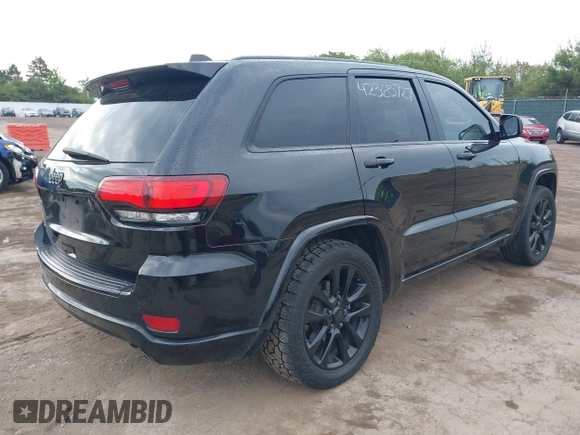 2018 Jeep Grand Cherokee Altitude with VIN 1C4RJFAG0JC420683, listed as a IAAI auction lot 42365727 with 148,730 mi miles and . Bid and sale history available at DreamBid. Image 4.