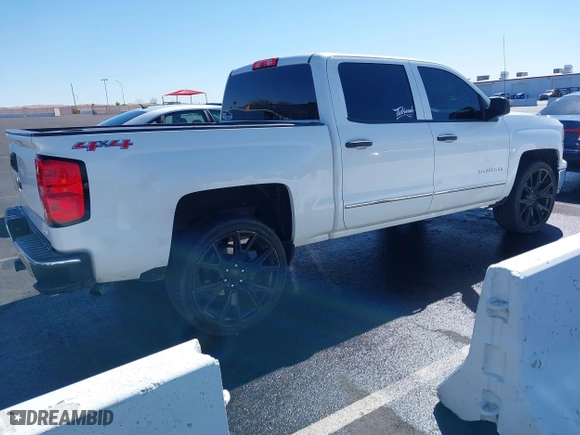 2014 Chevrolet Silverado 1500 LT with VIN 3GCUKRECXEG548397, listed as a IAAI auction lot 41746858 with 215,490 mi miles. Bid and sale history available at carsss.com. Image 4.