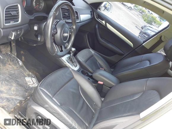 2015 Audi Q3 Premium Plus z VIN WA1EFCFS8FR001278, wystawiony jako IAAI lot #42475043 z przebiegiem 125 417 mil mil oraz . Historia ofert i sprzedaży dostępna na DreamBid. Obrazek 20.