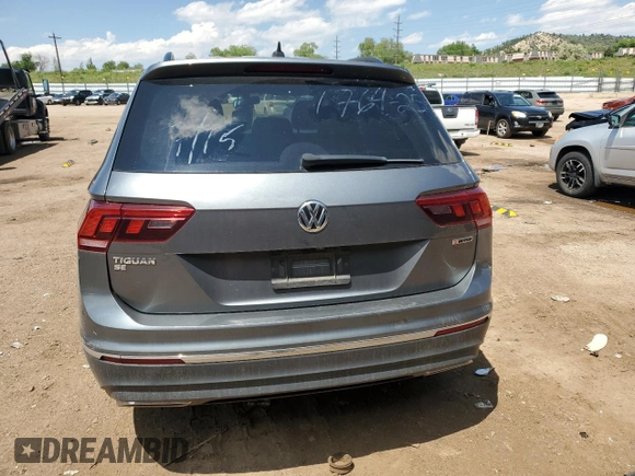 2021 Volkswagen Tiguan SE z VIN 3VV2B7AX3MM032467, wystawiony jako Copart lot #59904945 z przebiegiem Nie podano mil oraz Szkoda całkowita • Salvage title. Historia ofert i sprzedaży dostępna na DreamBid. Obrazek 6.