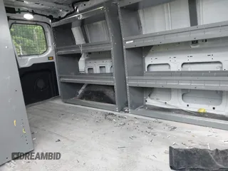 2020 Ford Transit Cargo z VIN 1FTBR2Y80LKB22354, wystawiony jako IAAI lot #42347579 z przebiegiem 64 513 mil mil oraz . Historia ofert i sprzedaży dostępna na DreamBid. Obrazek 8.