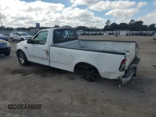 1999 Ford F-150 z VIN 1FTRF17W9XNB67119, wystawiony jako Copart lot #79197414 z przebiegiem Nie podano mil oraz Szkoda całkowita • Salvage title. Historia ofert i sprzedaży dostępna na DreamBid. Obrazek 2.
