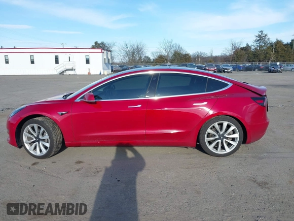 2019 Tesla Model 3 Mid Range with VIN 5YJ3E1EA3KF466418, listed as a IAAI auction lot 41724564 with 53,774 mi miles and . Bid and sale history available at DreamBid. Image 14.