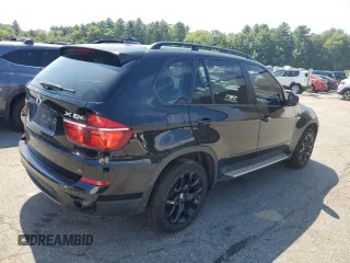 2012 BMW X5 35i with VIN 5UXZV4C54CL752079, listed as a Copart auction lot 62147515 with 147,244 mi miles and Clean title. Bid and sale history available at DreamBid. Image 3.