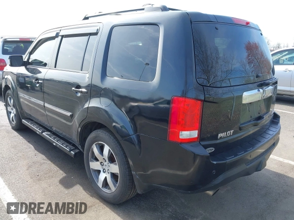 2012 Honda Pilot Touring with VIN 5FNYF4H96CB041380, listed as a IAAI auction lot 41941615 with 137,537 mi miles and . Bid and sale history available at DreamBid. Image 3.