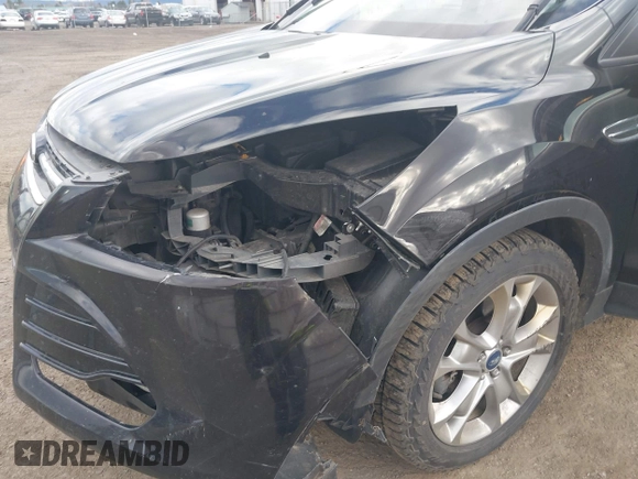 2013 Ford Escape SEL with VIN 1FMCU9H99DUA94169, listed as a IAAI auction lot 41937675 with 106,405 mi miles. Bid and sale history available at carsss.com. Image 6.
