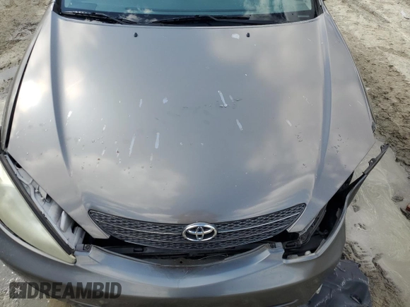 2003 Toyota Camry LE with VIN 4T1BE30K43U724778, listed as a Copart auction lot 53515605 with 176,568 mi miles and Salvage Title. Bid and sale history available at DreamBid. Image 11.