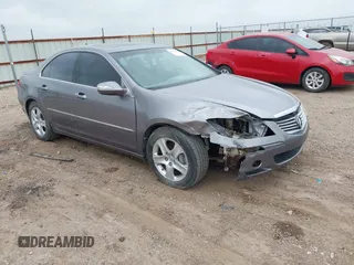 2006 Acura RL z VIN JH4KB16526C006190, wystawiony jako IAAI lot #42351400 z przebiegiem 150 749 mil mil oraz . Historia ofert i sprzedaży dostępna na DreamBid. Obrazek 1.