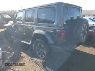 2018 Jeep Wrangler Unlimited Sahara with VIN 1C4HJXEN5JW203879, listed as a IAAI auction lot 41131467 with 87,065 mi miles and . Bid and sale history available at DreamBid. Image 3.