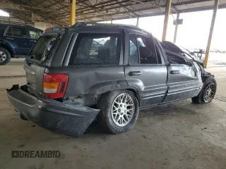2002 Jeep Grand Cherokee Limited with VIN 1J8GX58N72C294837, listed as a Copart auction lot 56201145 with 218,345 mi miles and Salvage Title. Bid and sale history available at DreamBid. Image 3.