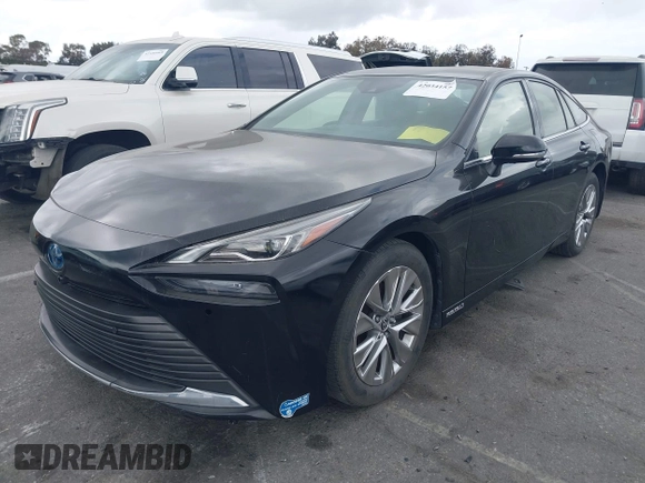 2021 Toyota Mirai XLE with VIN JTDAAAAA1MA002323, listed as a IAAI auction lot 42034157 with 16,592 mi miles and . Bid and sale history available at carsss.com. Image 2.