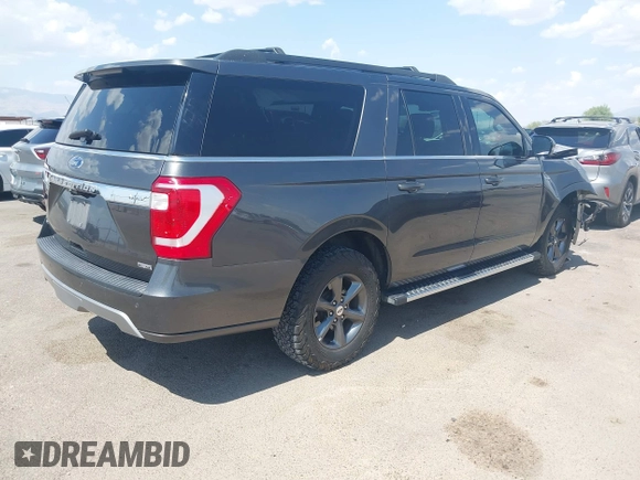 2021 Ford Expedition Max XLT with VIN 1FMJK1JTXMEA54312, listed as a IAAI auction lot 42644692 with 57,816 mi miles and . Bid and sale history available at DreamBid. Image 4.