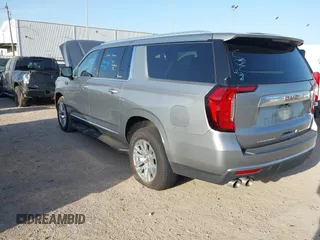 2023 GMC Yukon XL Denali with VIN 1GKS1JKL0PR327818, listed as a IAAI auction lot 41734739 with 54,939 mi miles. Bid and sale history available at carsss.com. Image 3.