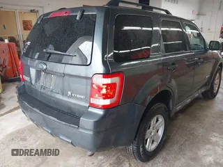 2009 Ford Escape Hybrid with VIN 1FMCU49339KB19700, listed as a IAAI auction lot 42253749 with 169,299 mi miles and . Bid and sale history available at DreamBid. Image 4.