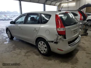 2011 Hyundai Elantra Touring GLS with VIN KMHDB8AE6BU097622, listed as a Copart auction lot 73031634 with 100,697 mi miles and Salvage Title. Bid and sale history available at carsss.com. Image 2.