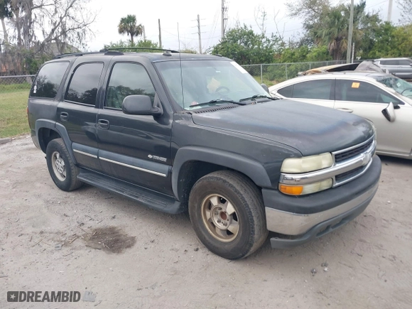 2003 Chevrolet Tahoe LT with VIN 1GNEC13Z93R296379, listed as a IAAI auction lot 41574575 with 301,567 mi miles. Bid and sale history available at carsss.com. Image 1.