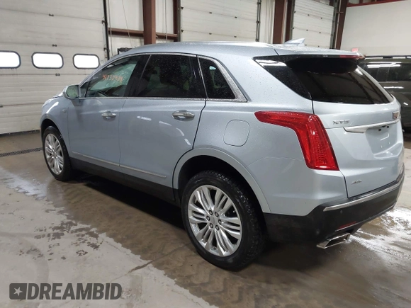 2017 Cadillac XT5 Premium Luxury AWD z VIN 1GYKNERS4HZ306955, wystawiony jako IAAI lot #41932934 z przebiegiem 150 050 mil mil oraz . Historia ofert i sprzedaży dostępna na DreamBid. Obrazek 3.