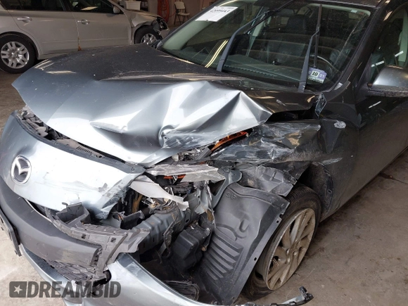 2012 Mazda 3 i Grand Touring with VIN JM1BL1W88C1677511, listed as a IAAI auction lot 42099443 with 185,138 mi miles and . Bid and sale history available at DreamBid. Image 6.
