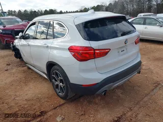 2018 BMW X1 sDrive28i with VIN WBXHU7C37J5H39401, listed as a IAAI auction lot 41421610 with 94,576 mi miles. Bid and sale history available at carsss.com. Image 3.